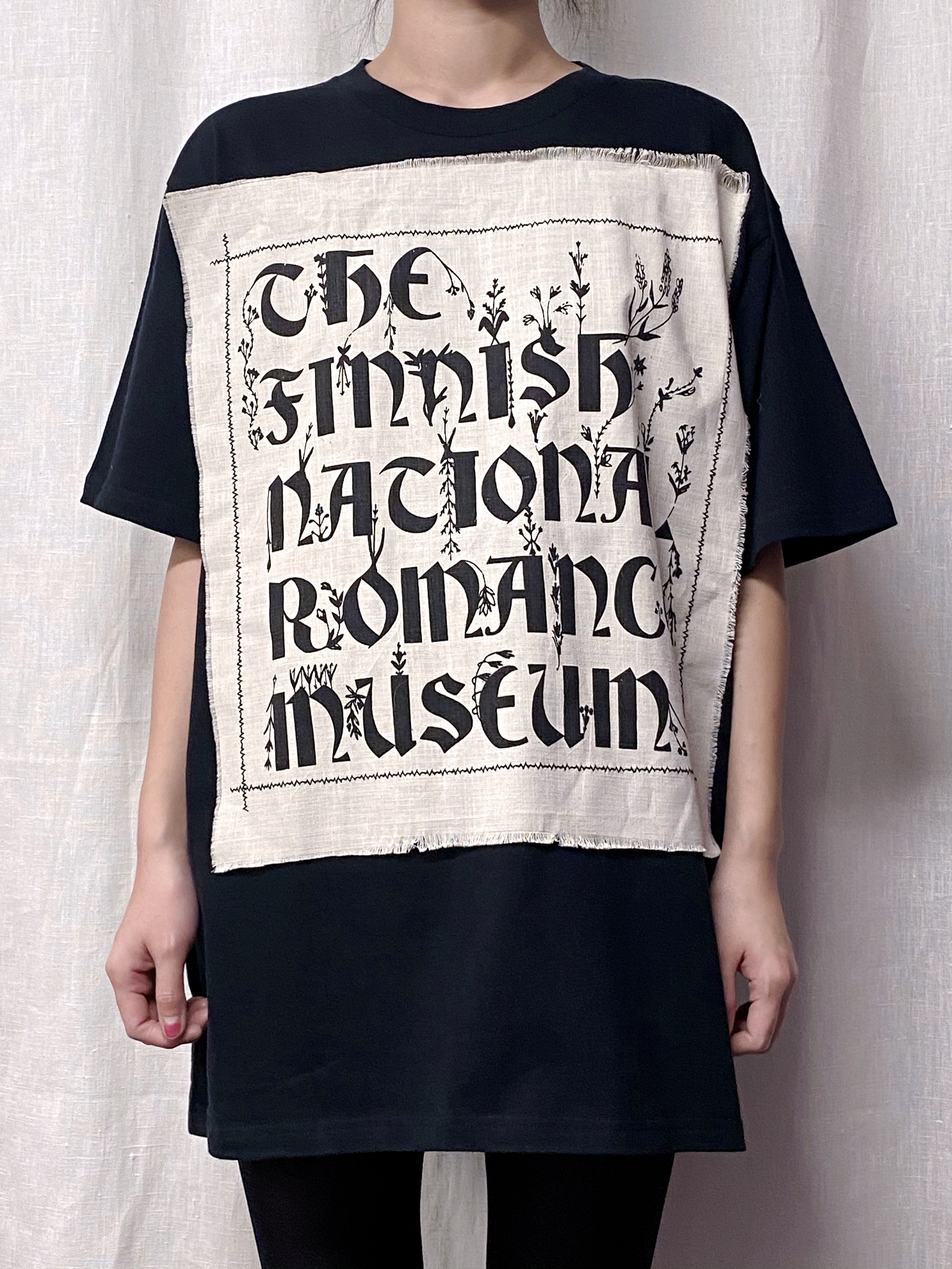 The Finnish National Romance Museum creates ready to wear pieces inspired by Finnish nature, history and culture. The FNRM Museo T-shirt, black.