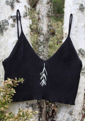 The FNRM Knitted top with stitching. The Finnish National Romance Museum creates ready to wear pieces inspired by Finnish nature, history and culture.